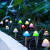 Garden Of Eden LED-es szolár lámpa - 12 db mini gomba - színes - 28,5 cm x 4 m 11243B