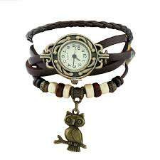  Karkötős karóra bagoly medállal fekete műbőr szíjjal karóra