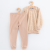 NEW BABY Gyermek pamut pizsama New Baby beige dino