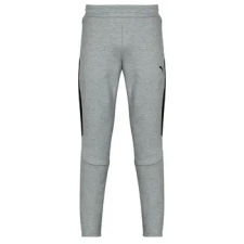 Puma Futónadrágok / Melegítők EVOSTRIPE CORE Pants Szürke US L férfi nadrág