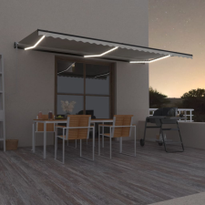 vidaXL Krémszínű automata szélérzékelős és LED-es napellenző 600x350cm (3069252) kerti bútor